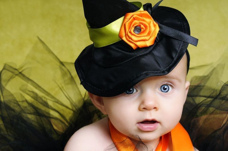Baby wearing witch hat