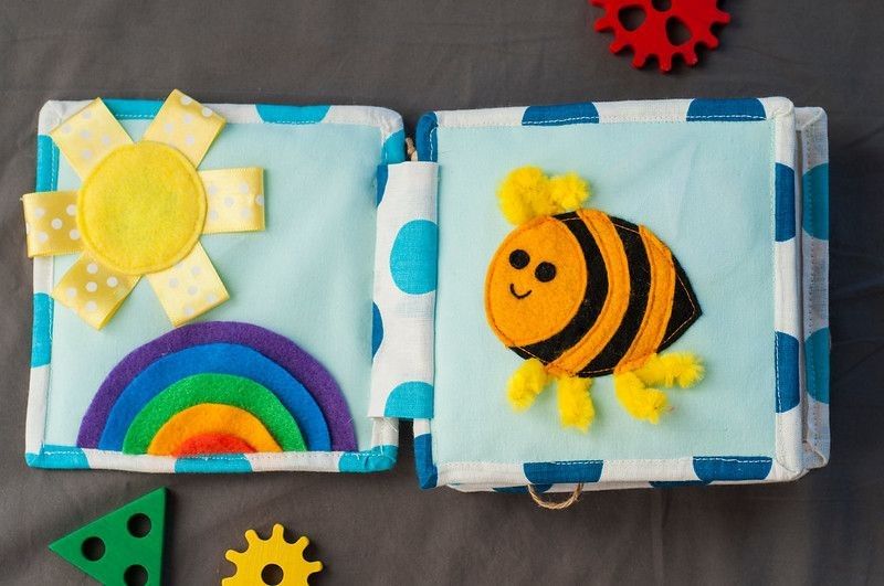 Pages with funny felt bee, woolly rainbow and sun