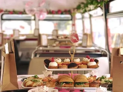 A tray of afternoon tea treats on a B Bakery Bus