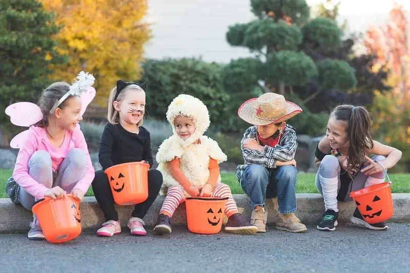 Kids tricking and treating during Halloween.