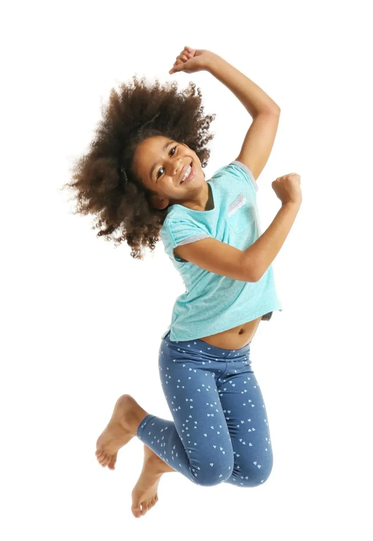 child jumping in mid air