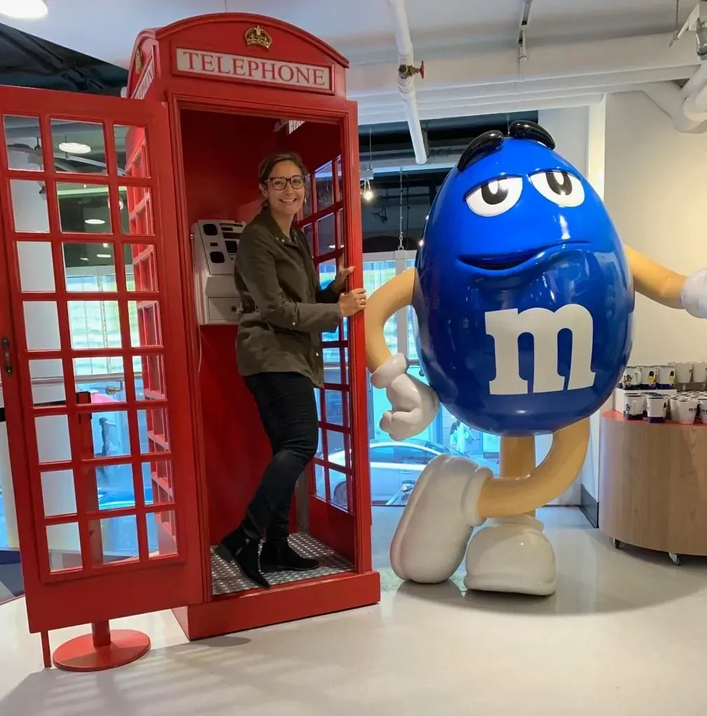 posing at the M&M store