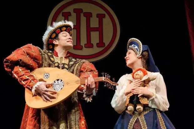 Anne Boleyn and Henry VIII performing in Horrible Histories Barmy Britain