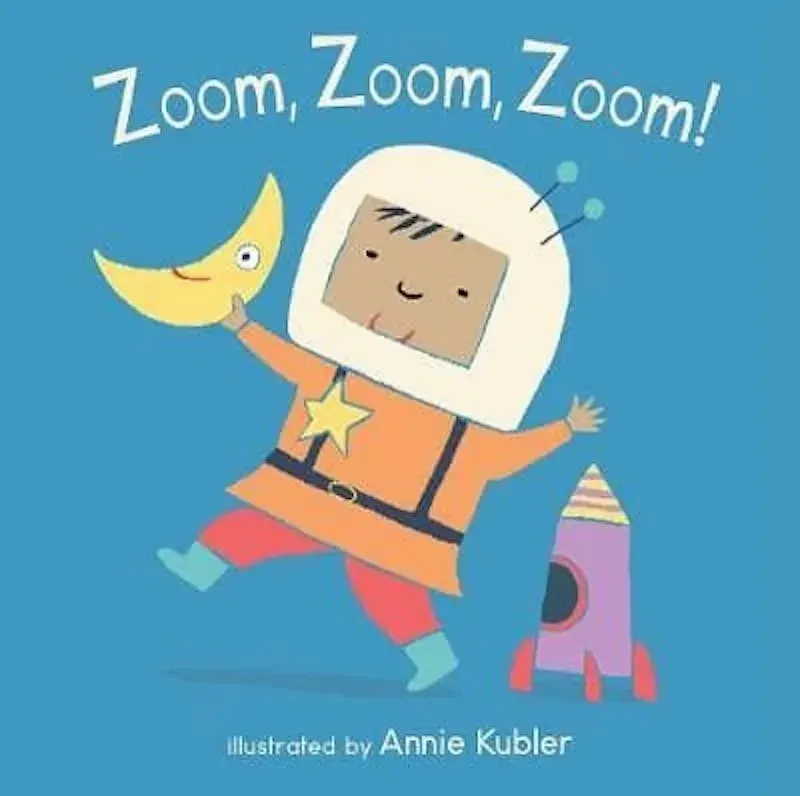 Cover of Zoom Zoom Zoom: against a blue background, a happy young child is wearing an astronaut helmet, holding a little toy moon in their hand.