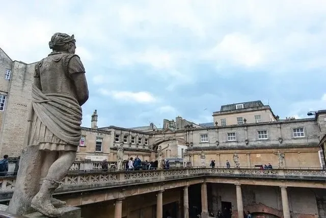Statue on the top balcony of the Roman baths, overlooking the water.
