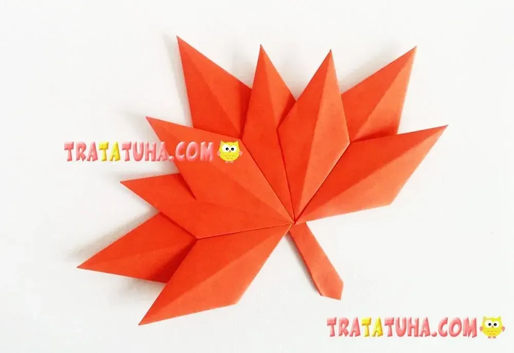 Red origami maple leaf.