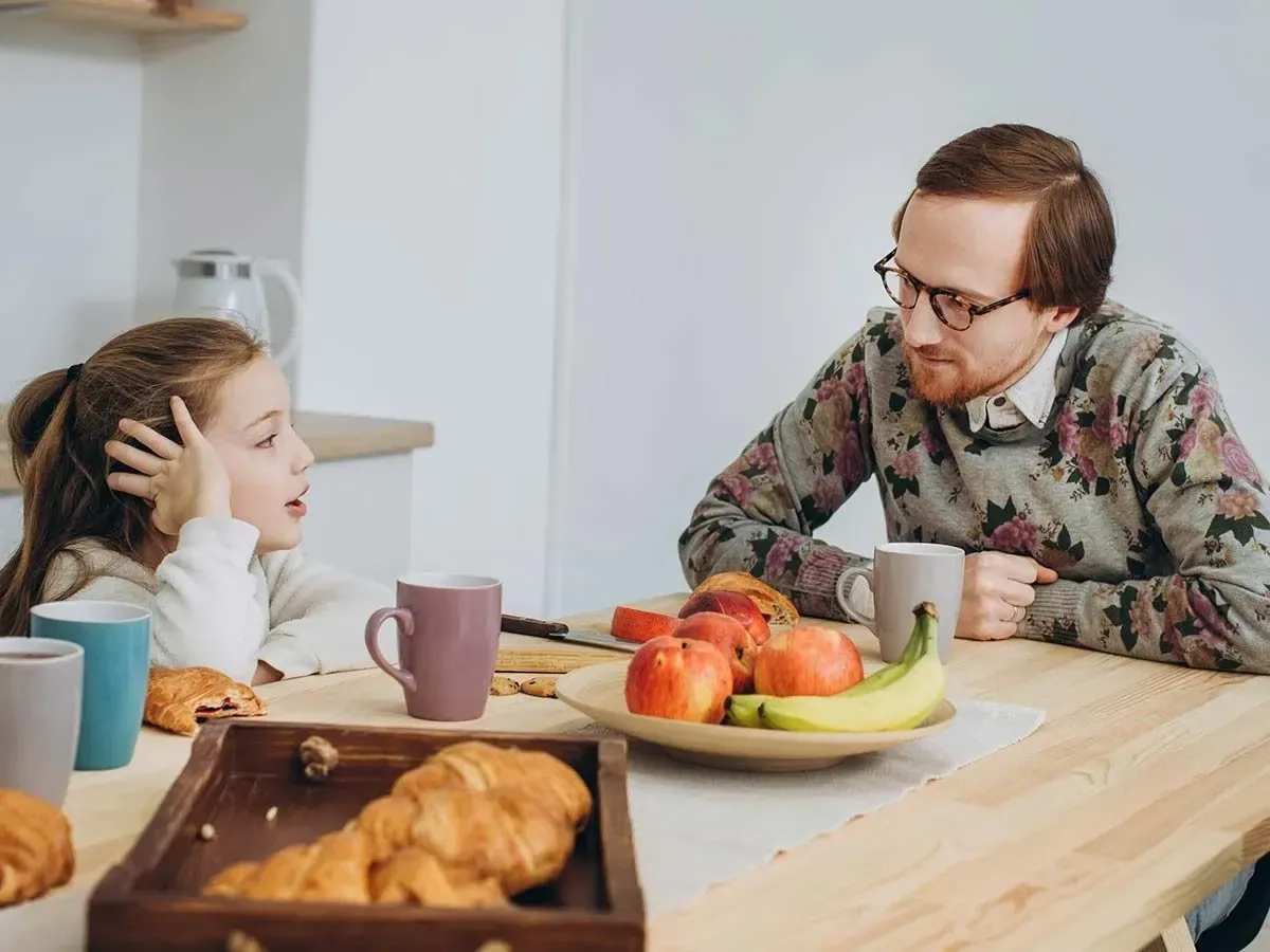 Dad and daughter sat at the breakfast table discussing synonyms.