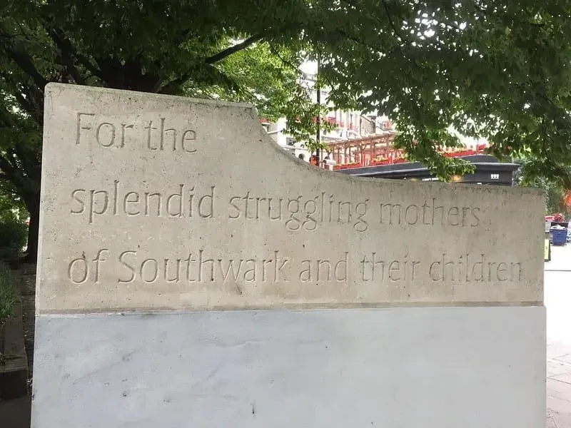 Stone monument which reads 'For the splendid struggling mothers of Southwark and their children'.