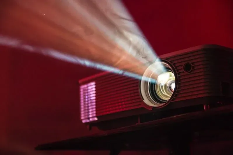 A projector showing movies at home. Image