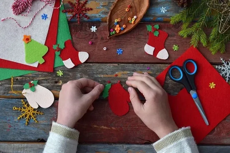 Making and putting up the Christmas decorations is a fun activity that gets everyone in the festive spirit.