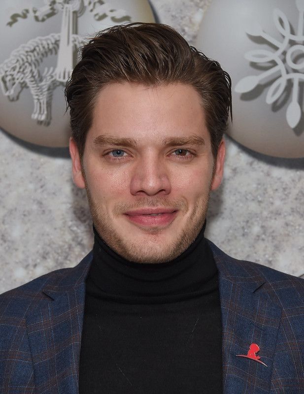 Dominic Sherwood arrives for the Brooks Brothers Holiday Celebration