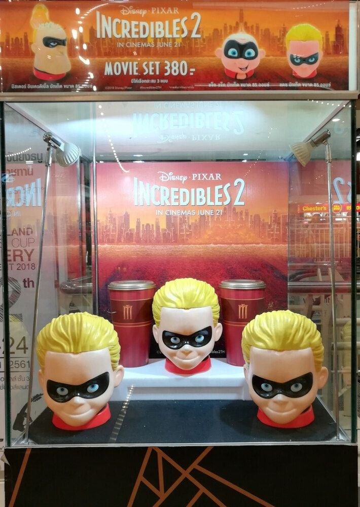 A display of a popcorn container toy set of American 3D computer-animated superhero film Incredibles 2 is display and on sell as part of movie promotion