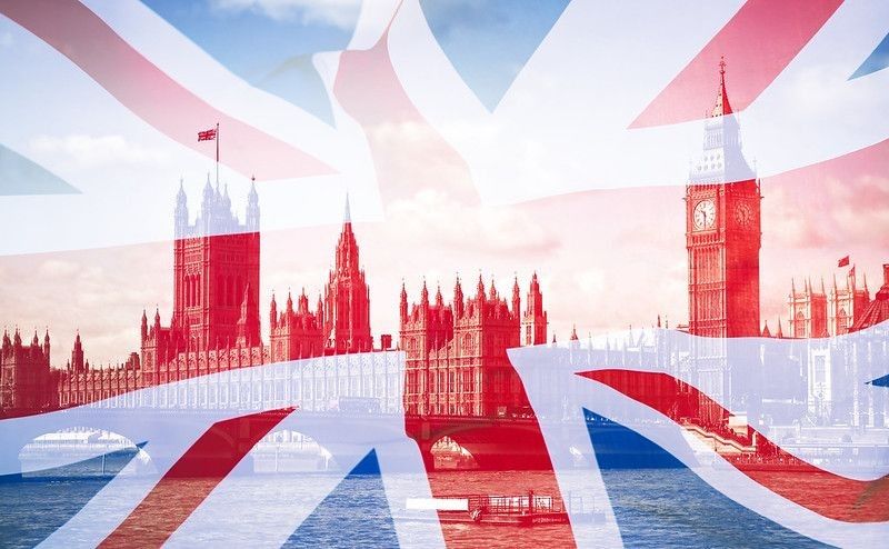 Double exposure of the United Kingdom flag and Big Ben