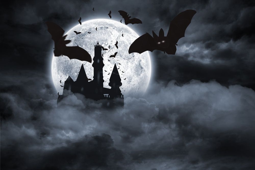 Digitally generated Bats flying from draculas castle.