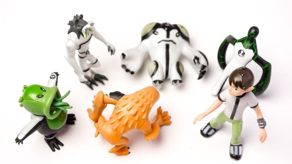 Toy figurines of Ben Tenison with aliens