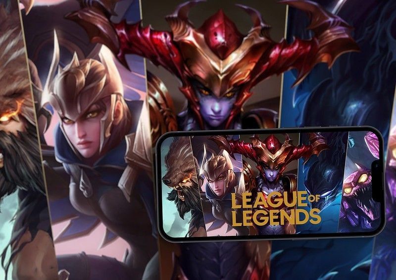 League of Legends poster with phone