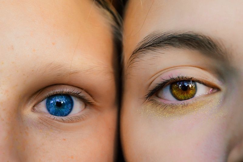 Two girls with different eye colour