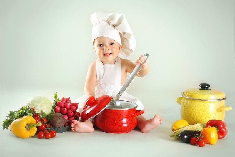 Baby wearing a chef hat