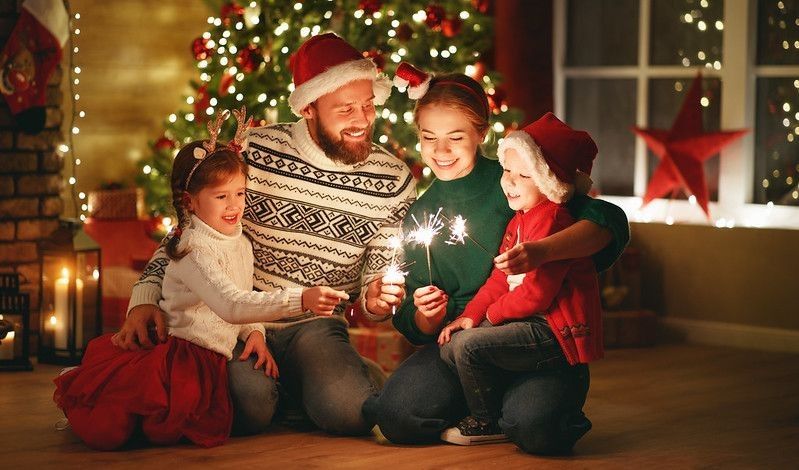 Family celebrating Christmas on Christmas Eve