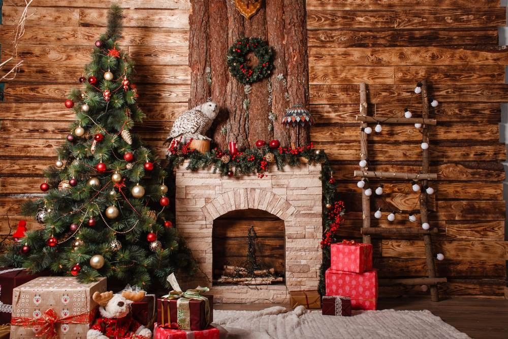 Beautiful New Year's interior with Christmas tree, fireplace and gifts.