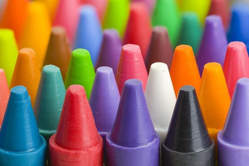 Group of Stacked Pile of Crayons Top View.
