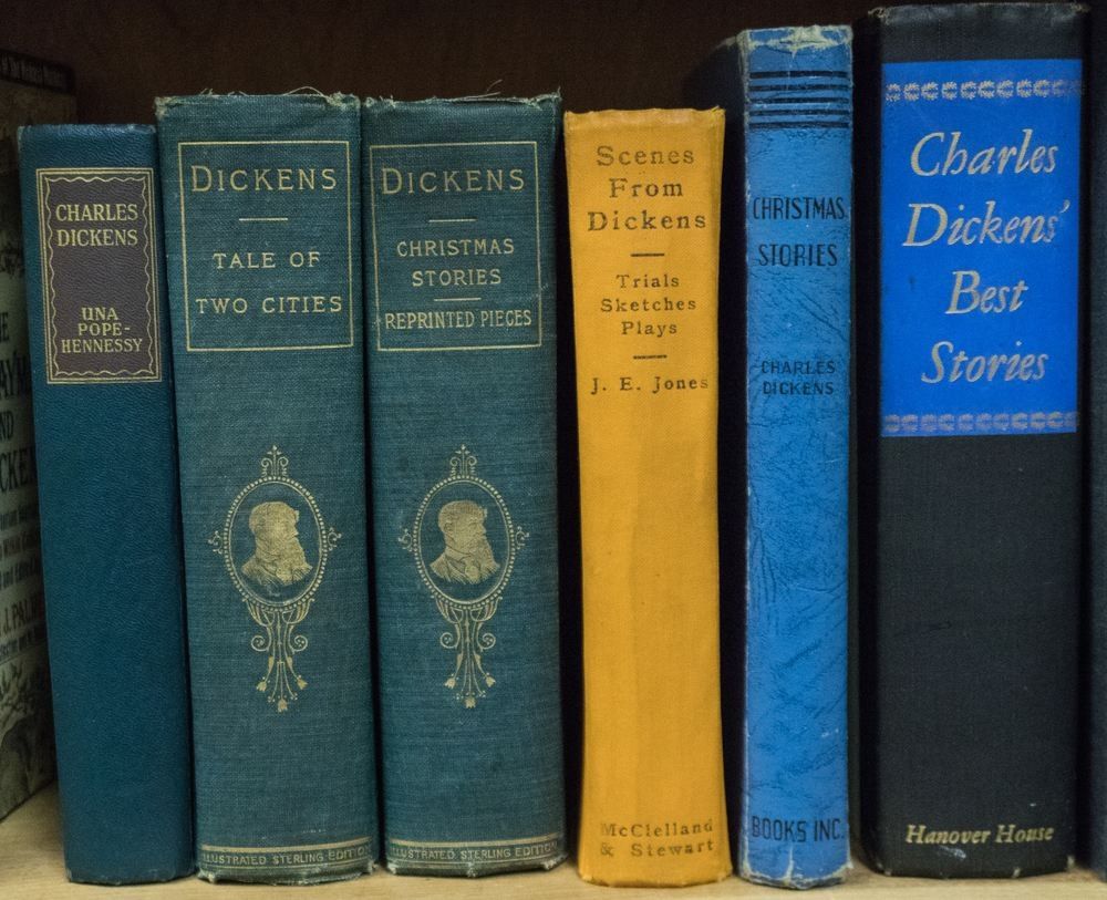 A collection of old, vintage, antique hardcover Charles Dickens books for sale at The Owl Pen Used Book Store