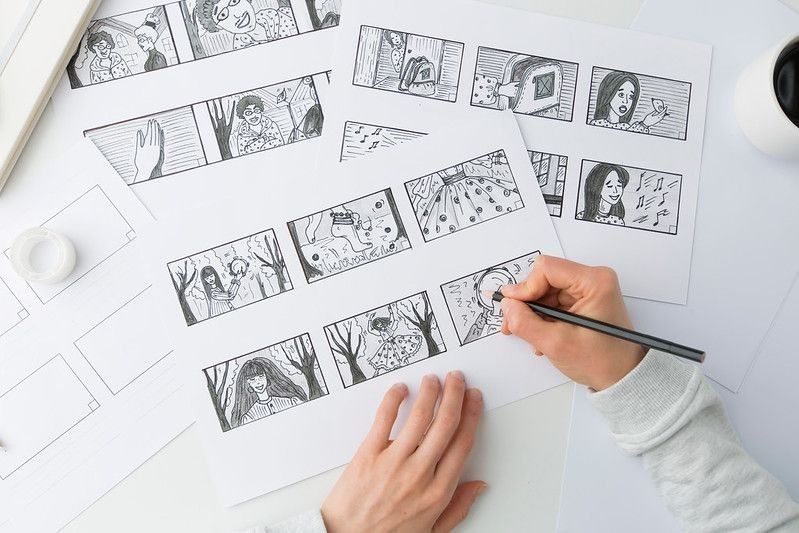Cartoonist drawing a storyboard for the film