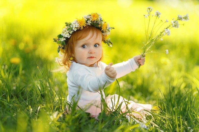 Little girl wearing spring flower crown