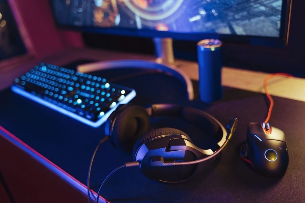 Pro gaming desk setup with headset