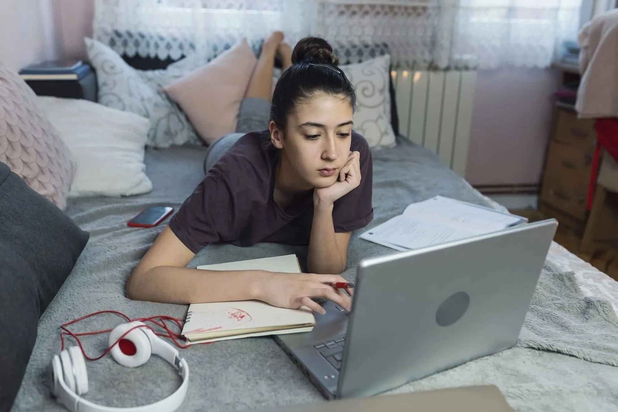 girl studying with her laptop