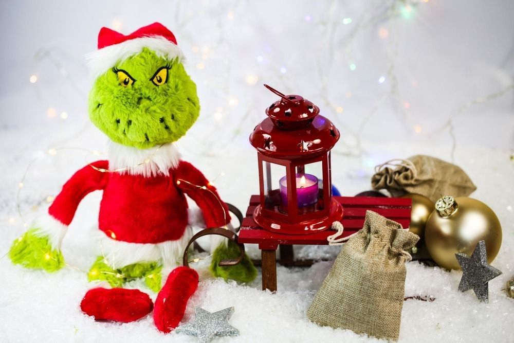 Grinch with lantern and white background