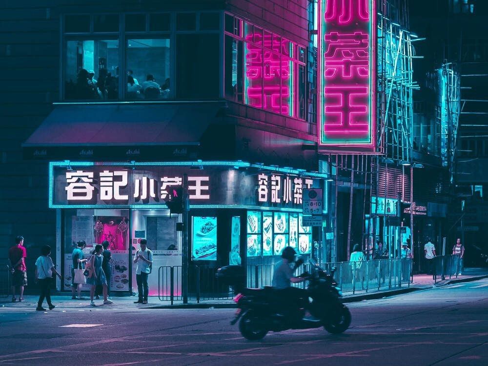 People crossing the street at Hongkong blade runner cyberpunk style
