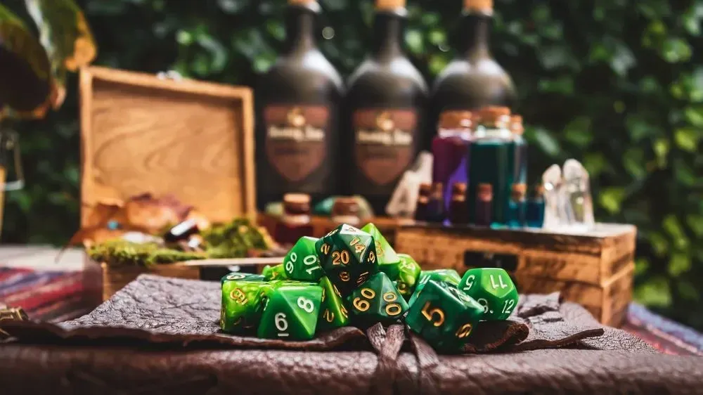 green d20 dice kept on leather