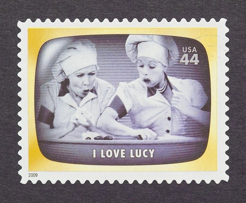 A postage stamp printed in USA commemorative of the american television program I Love Lucy, circa 2012.