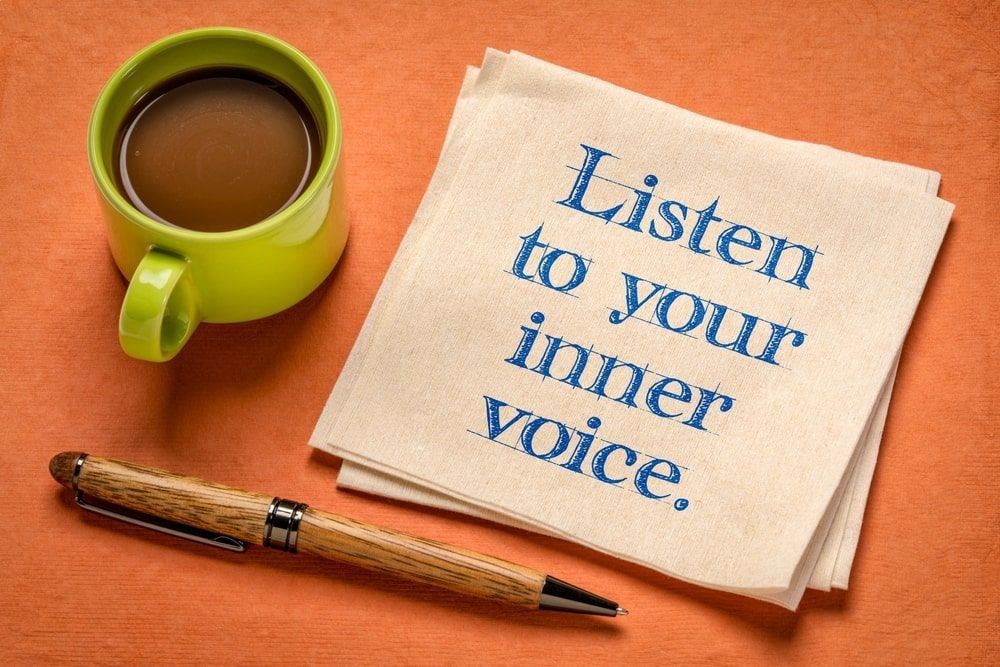 listen to your inner voice - inspirational handwriting on a napkin