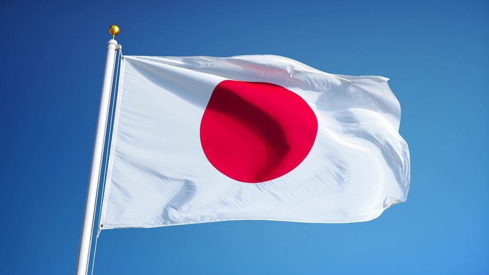 The Japanese flag hoisted on a pole
