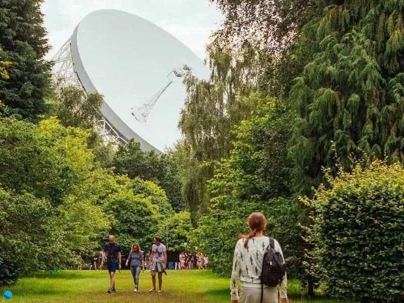 The Lovell Telescope at Jodrell Bank with its dominating presence among the trees.