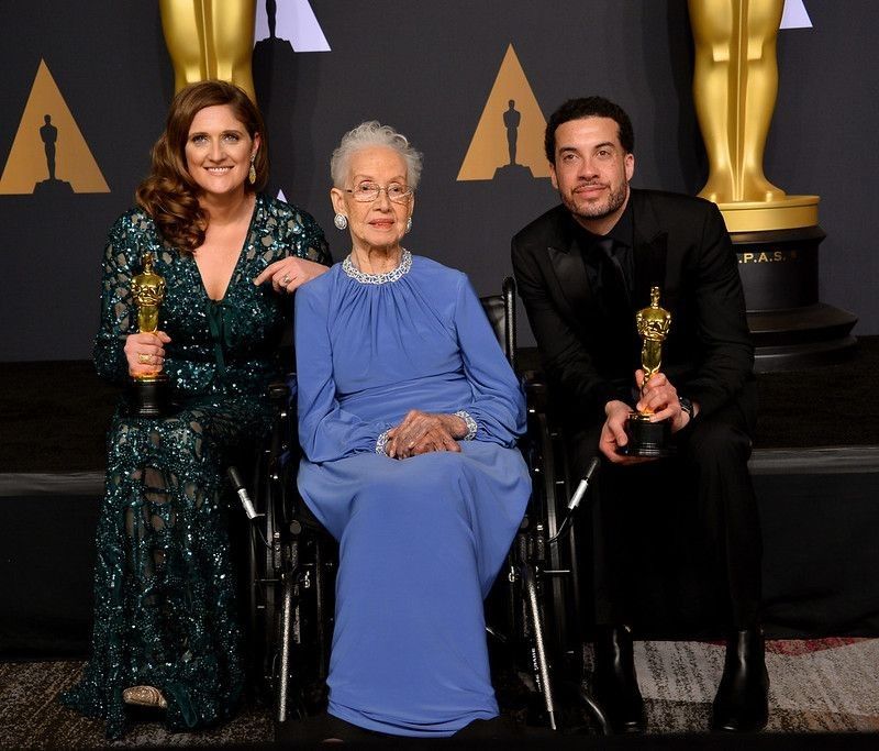 Ezra Edelman & Caroline Waterlow & NASA mathematician Katherine Johnson(Blue dress) in the photo room at the 89th Annual Academy Awards at Dolby Theatre, Los Angeles.
