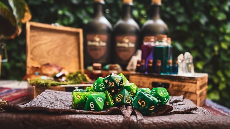Pile of green dice from Dungeons and Dragons board game
