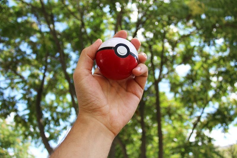 Person holding pokeball