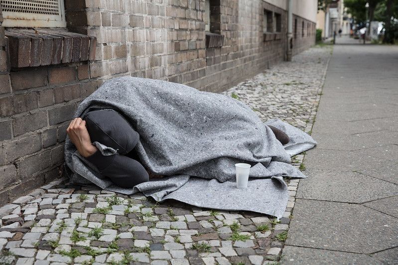 Homeless Man Covered With Blanket Sleeping
