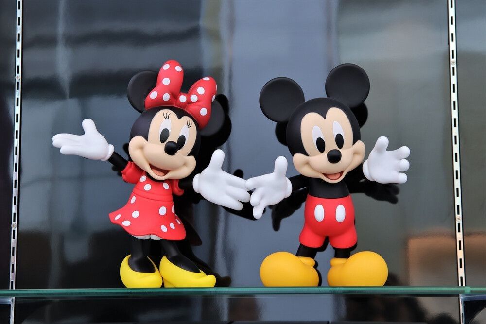 Mickey Mouse and Minnie mouse figure character in a toy gift shop