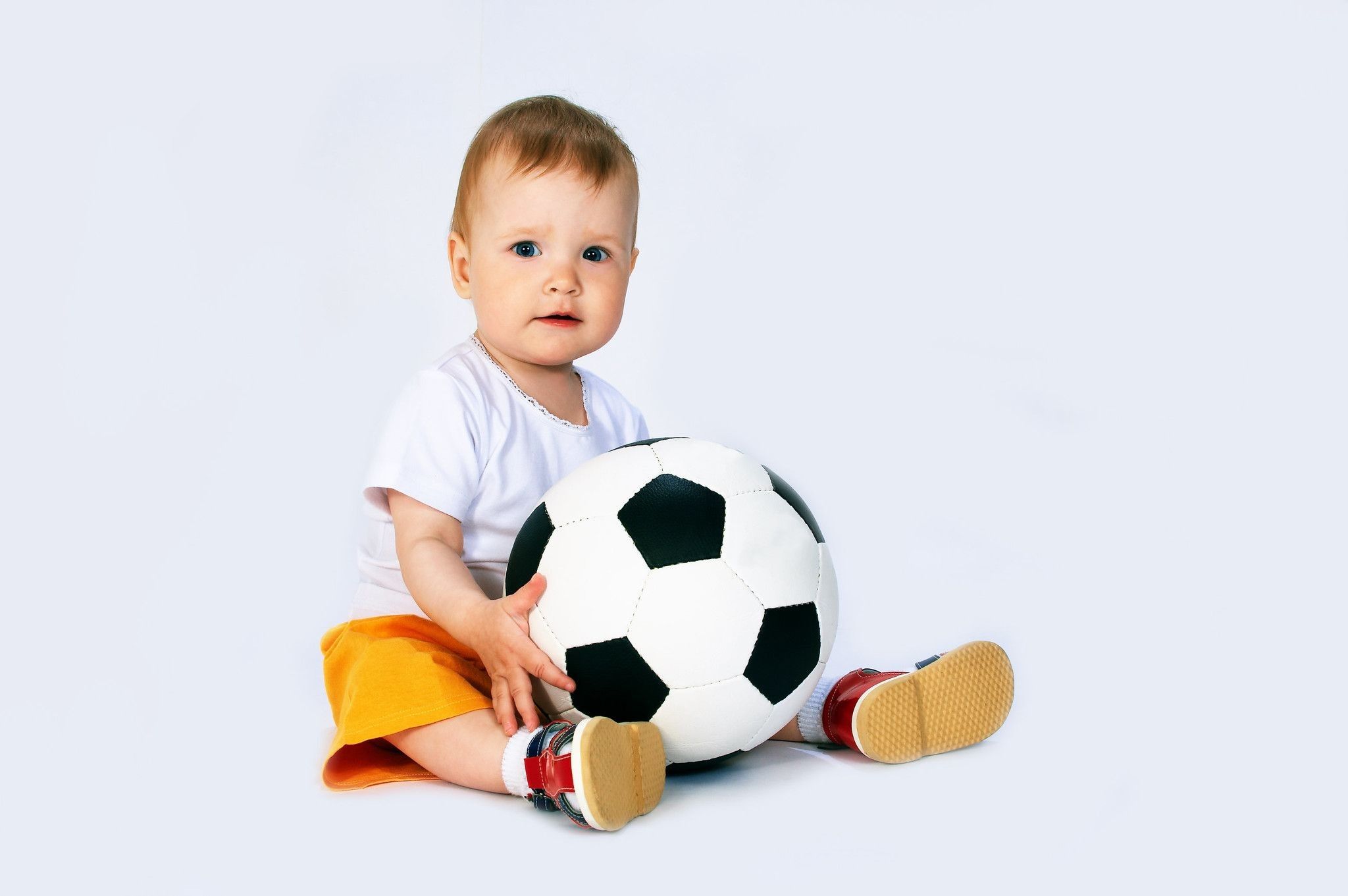 Baby holding football in hand - Nicknames