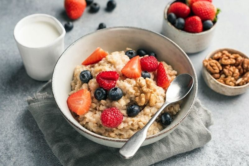 Healthy Oatmeal Porridge With Summer Berries in a bowl