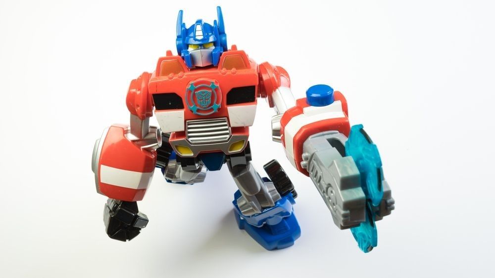 Figure toy of Playskool Optimus Prime from the Autobots Rescue Bots cartoon.