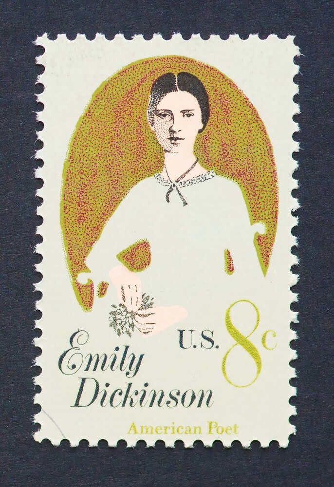 A postage stamp printed in USA showing an image of Emily Dickison, circa 1971.
