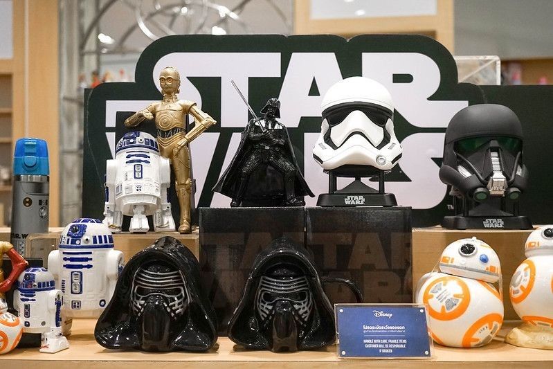 A photo of Star Wars merchandises on a shelf display.