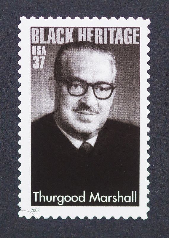 a postage stamp printed in USA showing an image of Thurgood Marshall, circa 2003.
