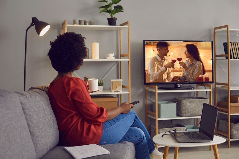 women watching tv at home
