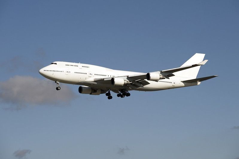 White Boeing 747 airplane in the sky